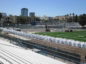 Bags of sand - 105 tons in all - used to help hold the new field in place (Photo courtesy UHEF)